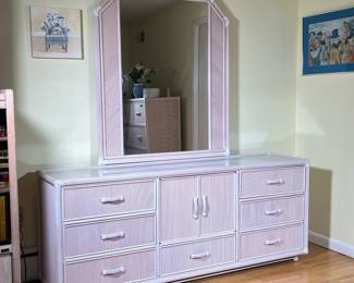 RATTAN DRESSING CONSOLE | Having a mirror over a glass top, seven drawers and double cabinet doors; mirror h. 46 x 41 in. - l. 72 x w. 18 x h. 29 in (cabinet only)