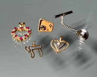 (4PC) 14K PENDANTS & OTHER JEWELRY | Including a contemporary tie pin marked "14k / JK" mounted with a moonstone (missing a stone), a diamond, sapphire, and ruby heart form pendant, a diamond & gold wirework pendant, and a hebrew letter pendant; together 5.9g