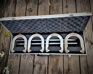 Old school horseshoe set in case.