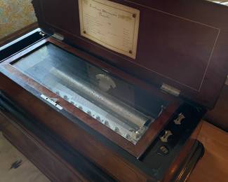 Sublime Harmonie Piccolo G Baker Troll &  Co Manufacturers GenevaA Swiss Inlaid and Parcel Ebonized Mahogany Cylinder Music Box
G. Baker-Troll and Co. Manufacturers, Geneva, Late 19th Century
serial number #14927