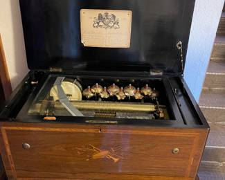 8 airs Music Box by Mermod Freres Antique Full Orchestra - the glass is cracked.  $5000 - has a bellows issue
