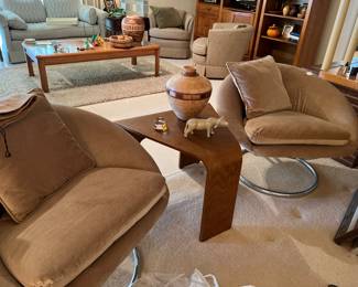 Mid century modern 1970s Italian chairs $895 for the pair. Waterfall table in the middle $245.