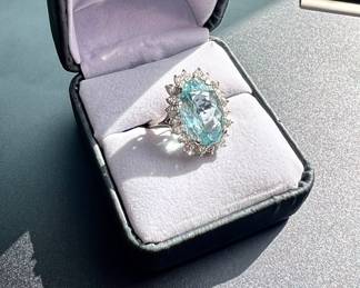6ct plus Aquamarine, surrounded by 1ct diamonds in 14kt white gold setting $2800