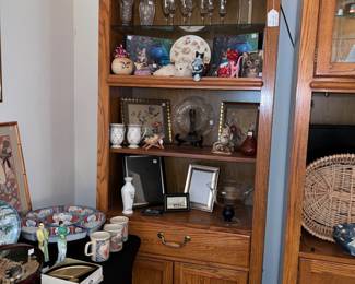 

Oak display shelf top to shelves are lighted- two metal shelves are bookshelves, drawer and cabinet $200