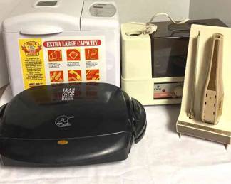 The Bread Machine, George Foreman Grill, Dominion Electric Knife, And Deluxe Ultrasonic Humidifier 