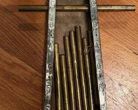Antique Child's Xylophone (We know, xylophones are wooden, but you get the idea.)