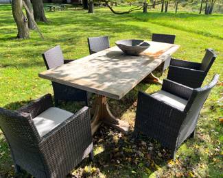 RH Outdoor Wooden Table with 6 Woven Outdoor Chairs. Table measures 9' x 39-1/2"W x 30" H