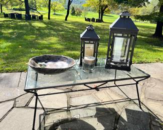 Outdoor table with lanterns and bowl
