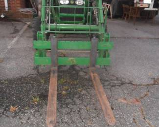 Forks being sold with tractor