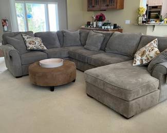 Very nice sectional and ottoman. The sectional is on 1- 1/2 years old. Price is $2500.00