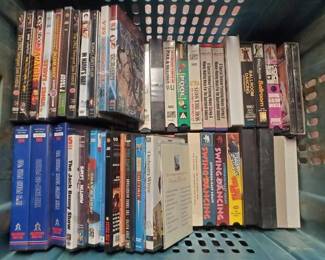 #7002 • Tote of DVDs and VHS Tapes
