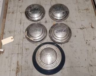 #7262 • (4) 9.5" Ford Hubcaps & 12.5" Ford Hubcap
