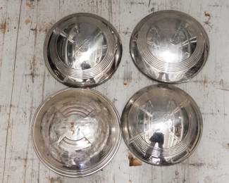 #7264 • (3) V8 Hubcaps & Mercury Hubcap
