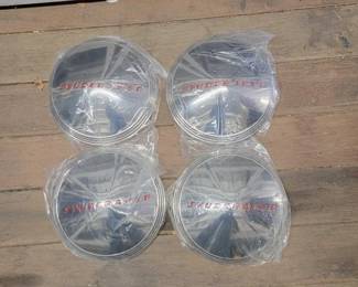 #7500 • (4) Studebaker Hubcaps
