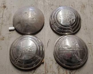 #7510 • (4) Vintage Hubcaps
