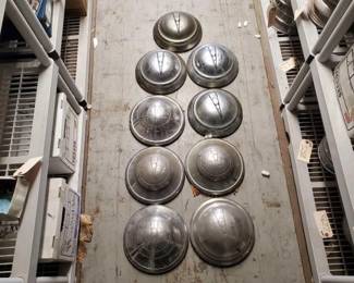 #7518 • (9) V8 Vintage Hubcaps
