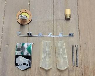 #7612 • Kaiser Frazer Emblems & Fuel Tank Sending Unit
