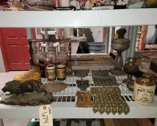 #674 • Lion Statue, Glass Bittles, Lamps & Coin Bags
