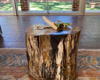 Handsome carved petrified wood end table