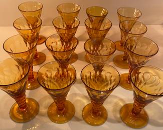 Lots of sets of amber stemware, plates , candlesticks 