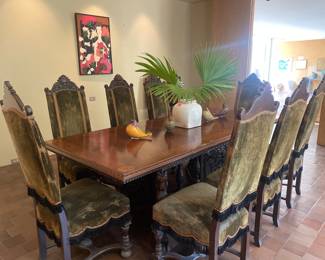Continental carved dining table and set of chairs 