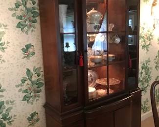 Lighted china cabinet.  Not too big and not too small.  