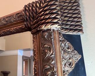 Ornate entryway mirror detail