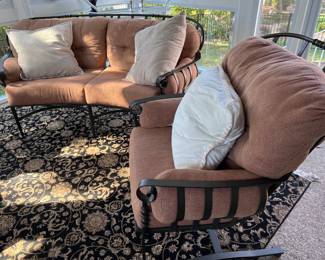 Black metal settee and chair