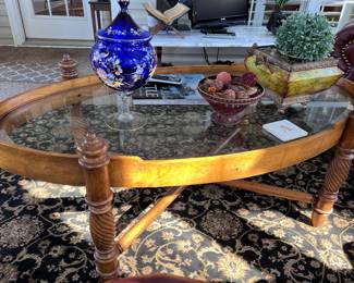 Oval glass top coffee table