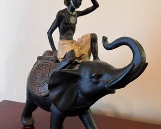 Wood elephant and boy