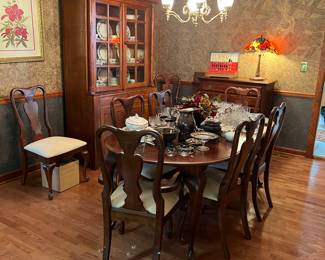 Cherry dining room table with 8 chairs 