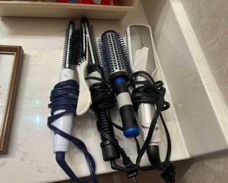 Hair care items in master bathroom