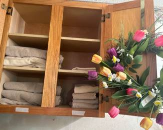 Towels and wreath in master bathroom