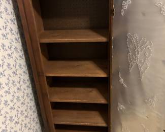 Inside pressed tin cabinet