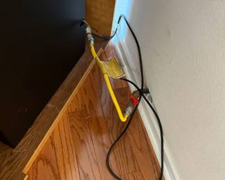 Behind gas fireplace