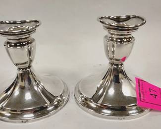 PAIR OF WEIGHTED SILVER CANDLE HOLDERS WITH UNKNOWN HALLMARK