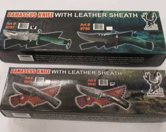 TWO DAMASCUS BLADE HUNTING KNIVES. THE BONE EDGE. MADE IN PAKISTAN. BOTH HAVE BOXES
