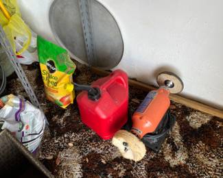 Shoeshiner, some potting soil, and a gas can