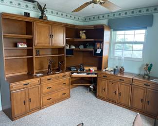 “Creative Ideas” Home/Office Wall Units. It comes in five pieces-  mix and match. It also has a matching desk.