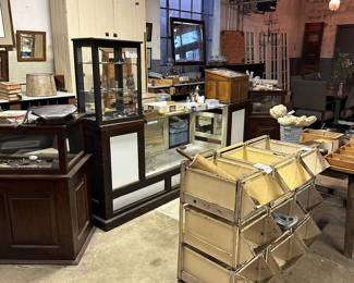 Antique show cases and metal bins