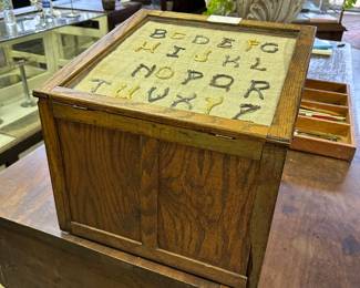 Antique oak counter top display cabinet with small drawers