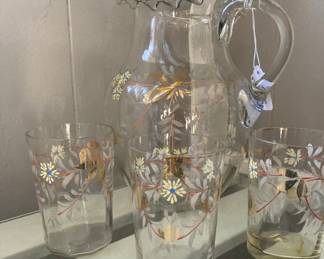 Old hand decorated pitcher and glasses