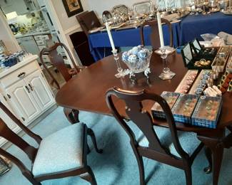 Harden Dining Table with 6 chairs.  Seats are beautifully reupholstered in blue.  There are 2 additional leaves and table pads to complete this set.