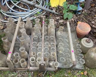 Local milk bottles $5 each wood carriers $6 each