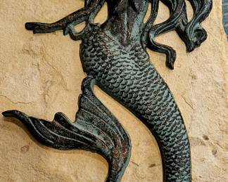 Cast iron mermaid