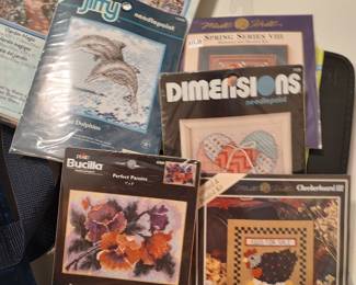 Assorted small needlepoint kits.  Most unopened