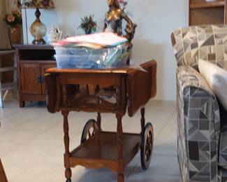 Vintage wooden rolling bar cart