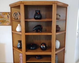 3 piece oak display cabinet filled with Mexican pottery