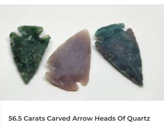 56.5 carats carved quartz into arrowheads