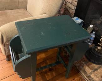 #7	Green Painted Wood Table w/two side magazine holders - 25x14x27	 $75.00 			

